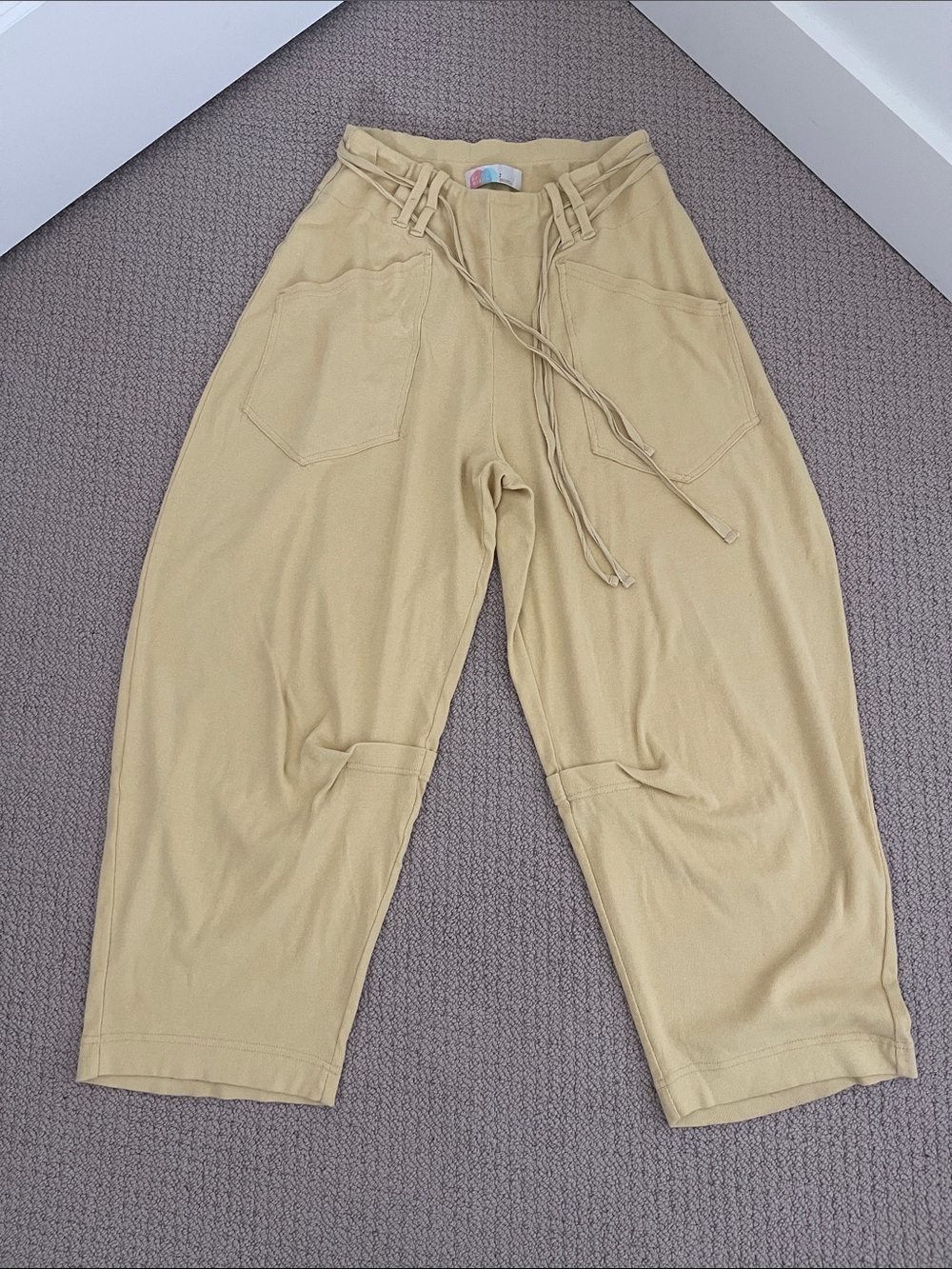 FP Beach muted yellow slouchy knit pants.